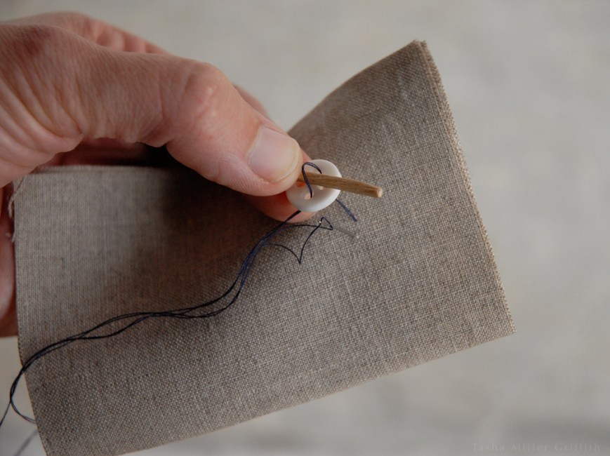 sewing on a button 2