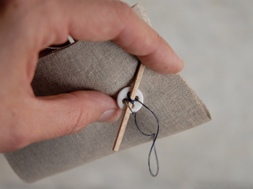 sewing on a button 4