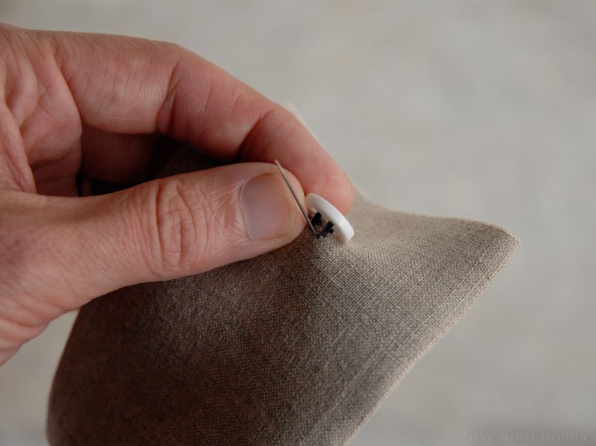 sewing on a button 6