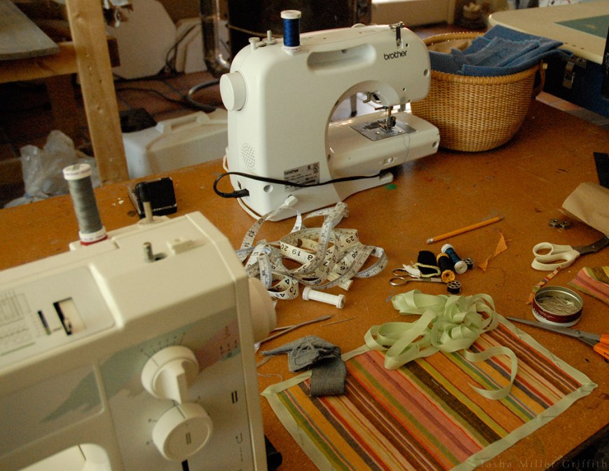 table with sewing machines
