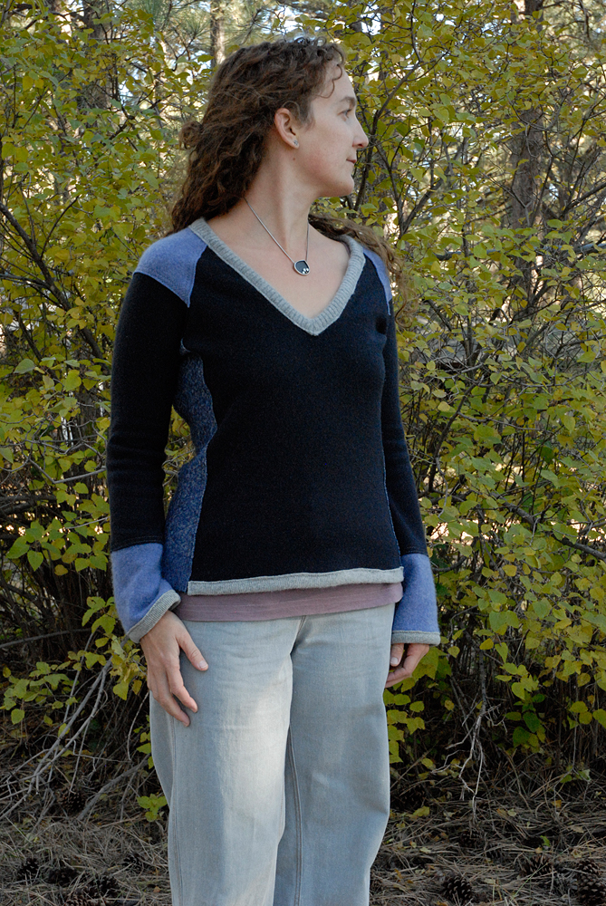 blue upcycled sweater looking side