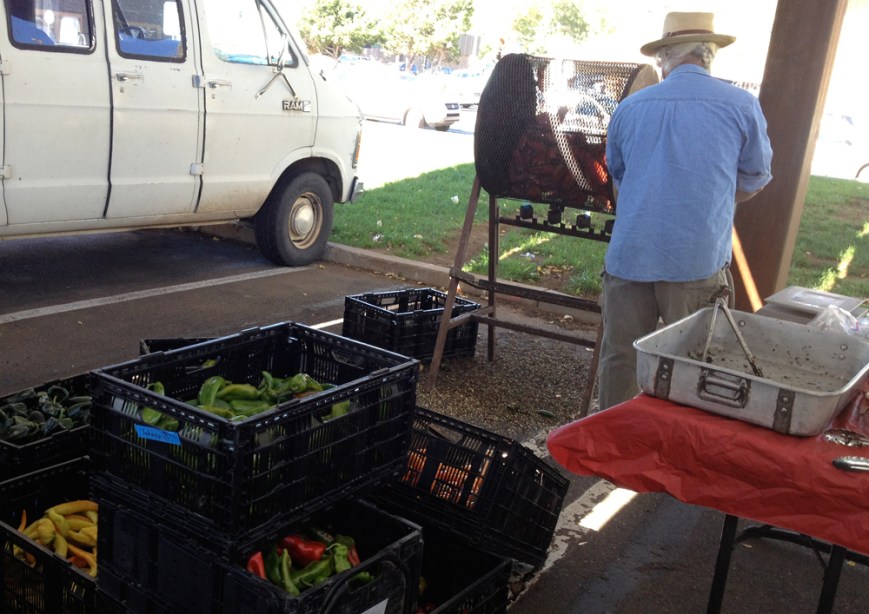 farmer roasting chile