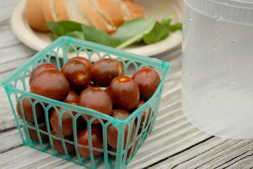 tomatoes in green basket 1