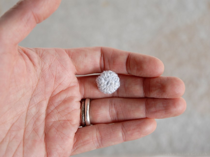 tiny knit covered buttons finished front