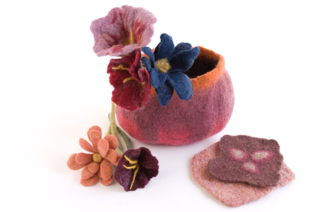 Felt coasters, flowers, and a bowl